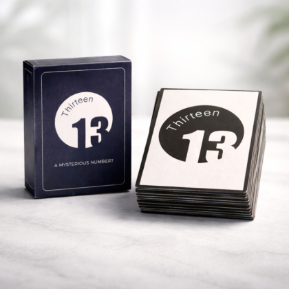 Thirteen card game box with stacked playing cards displayed on a minimal background